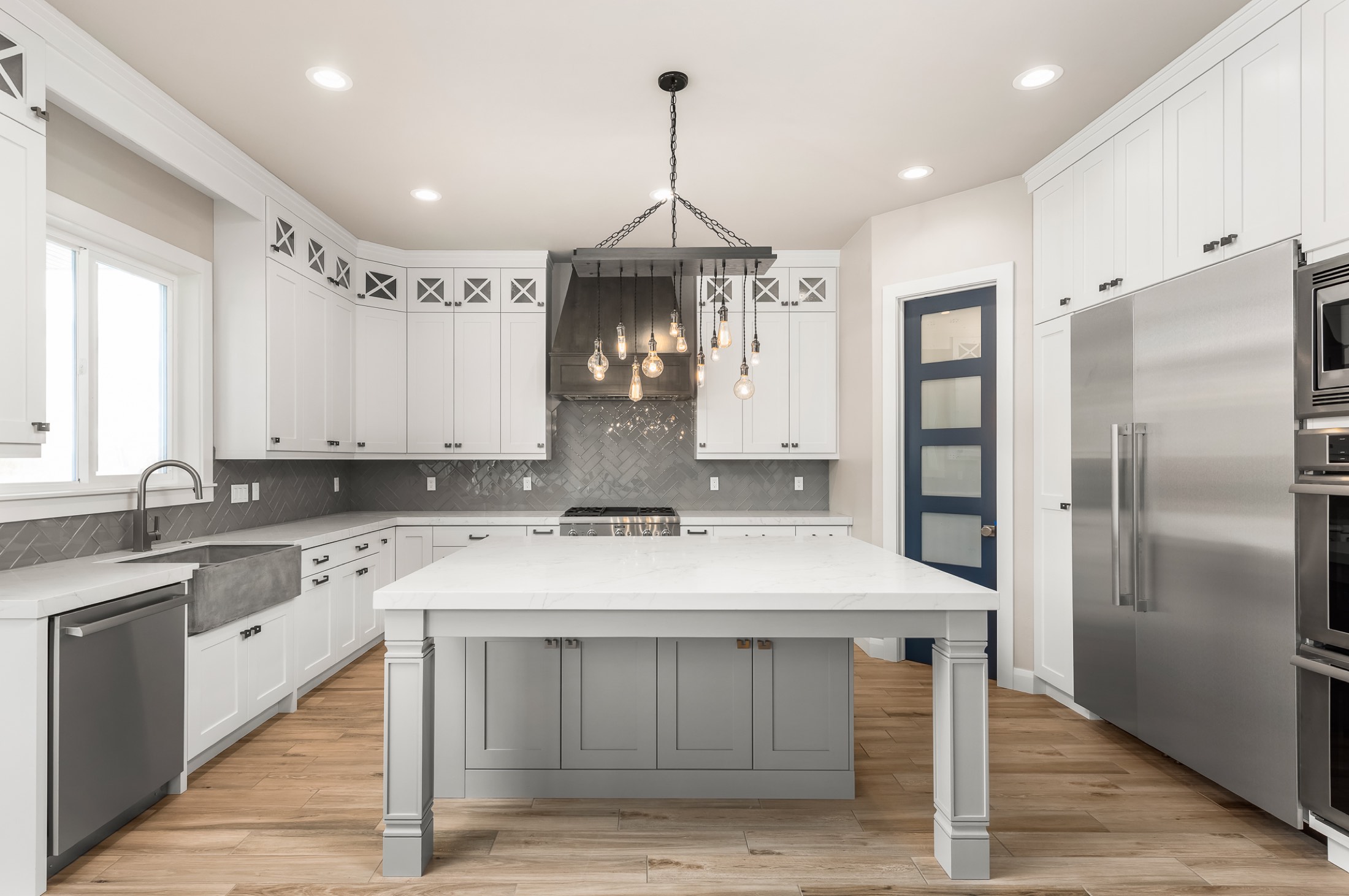 Kitchen island and painted shaker cabinetry