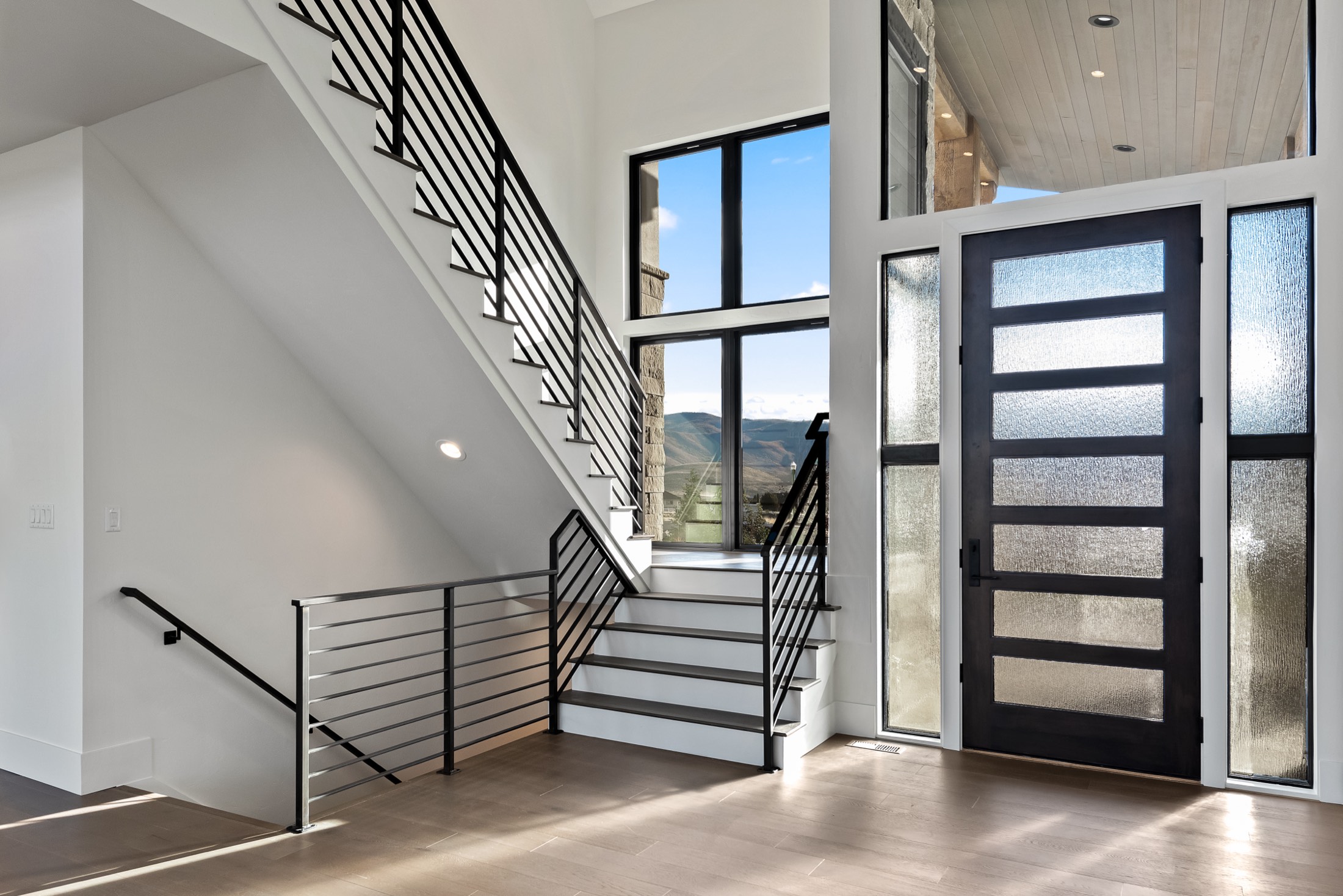 Staircase and glass entry door