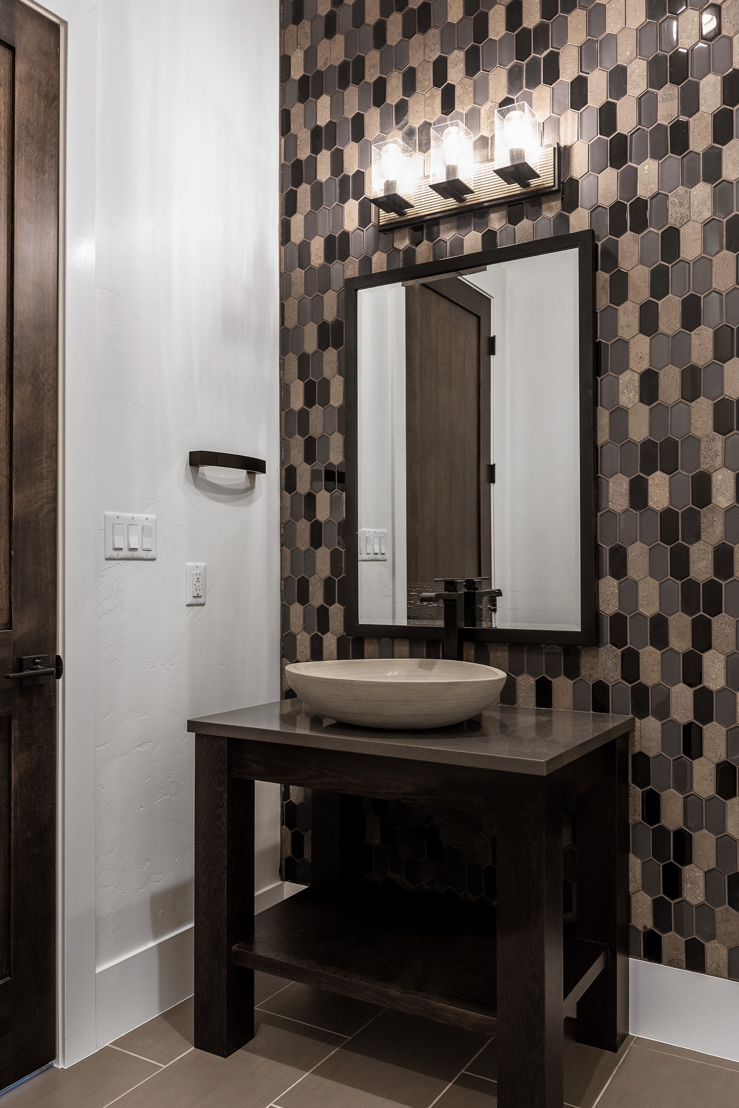Mosaic accent bath with vessel sink