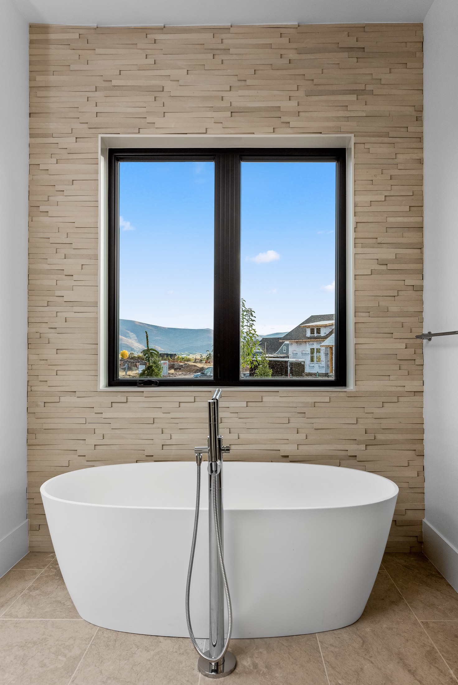 Brick-tile backsplash with mountain view