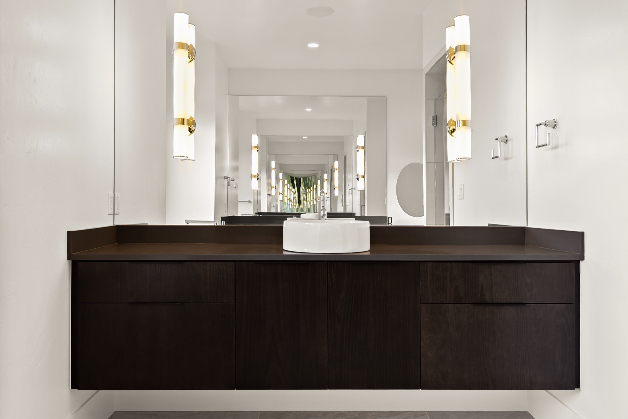 Double vanity in dark-stained wood